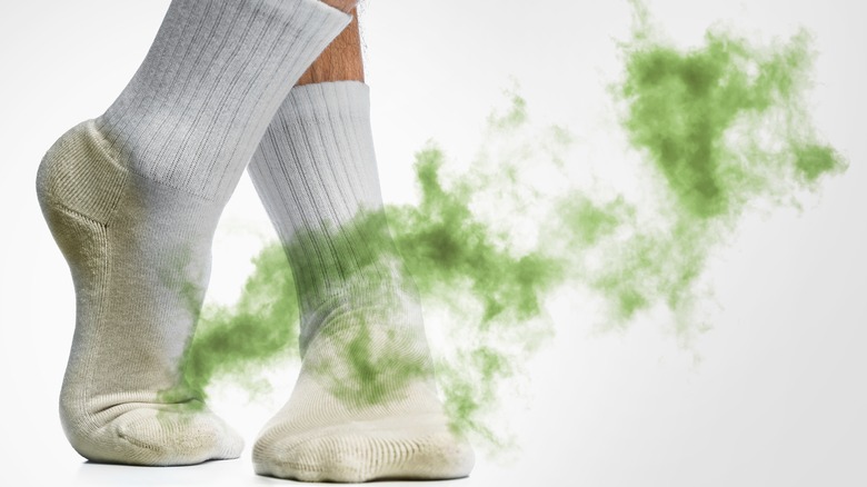 Green smoke rising from a pair of socks