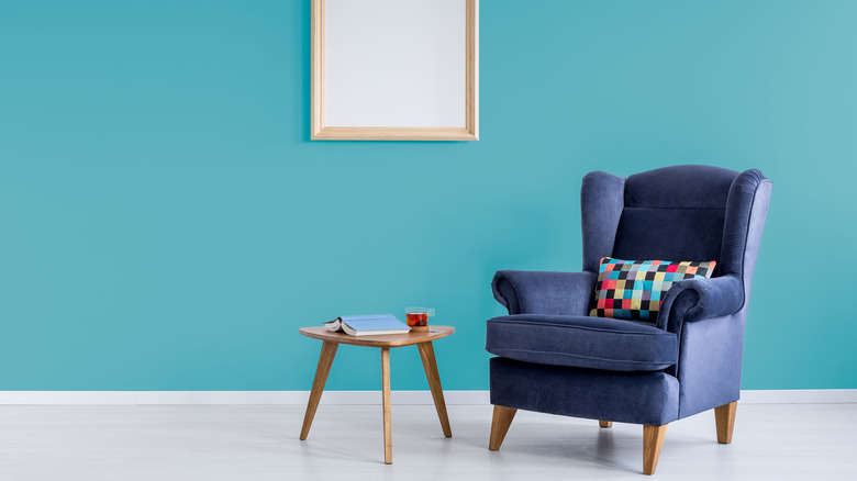 Blue aqua wall with furniture