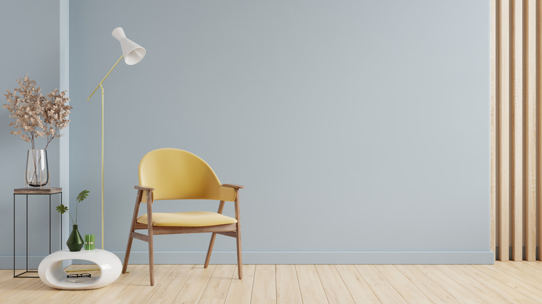 Pale aqua wall with furniture