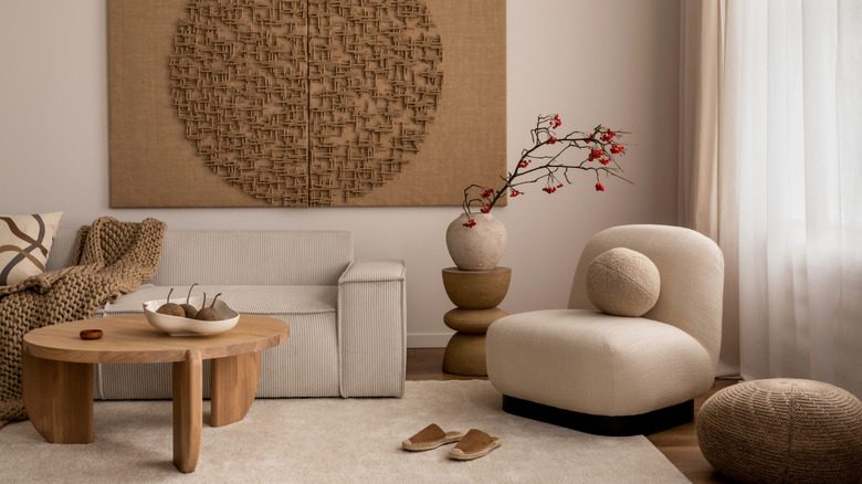 Wooden coffee table with pottery and woven balls