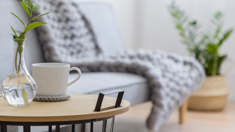 coffee table with mug on coaster