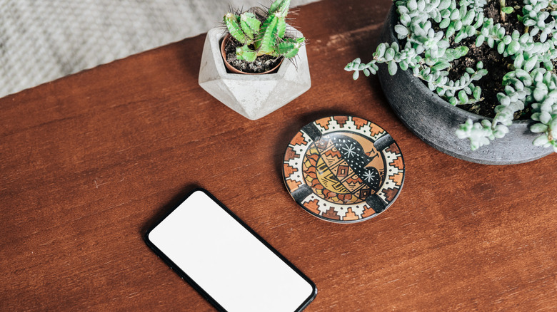 Grouping of three planters on table