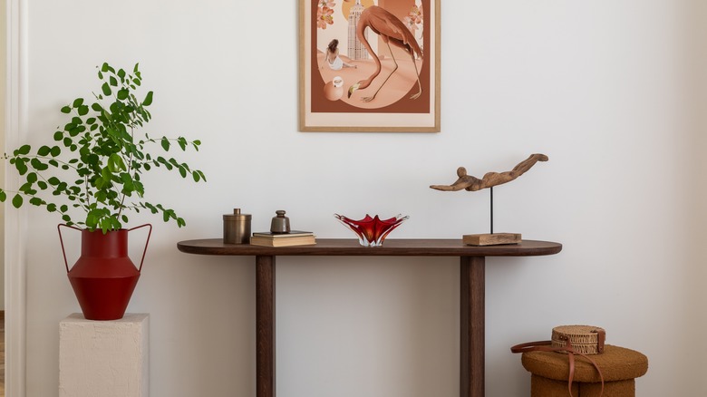 Console table in living room with home decor