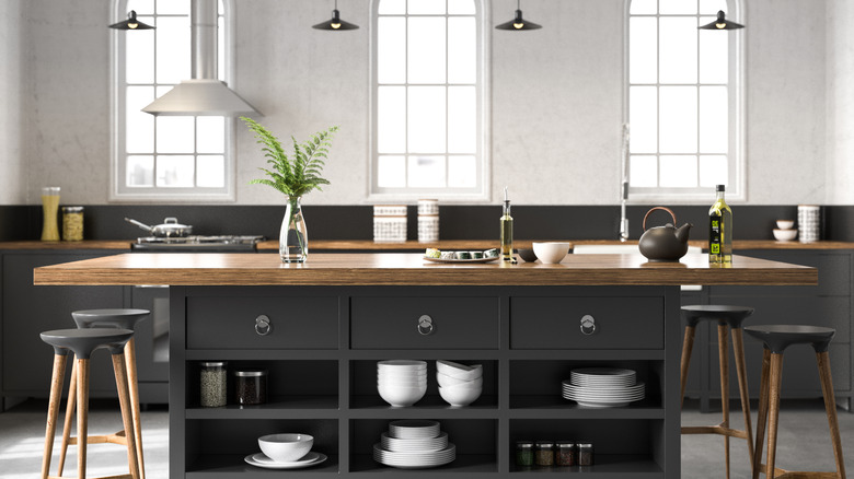 Dining table upcycled to a kitchen island with storage drawers