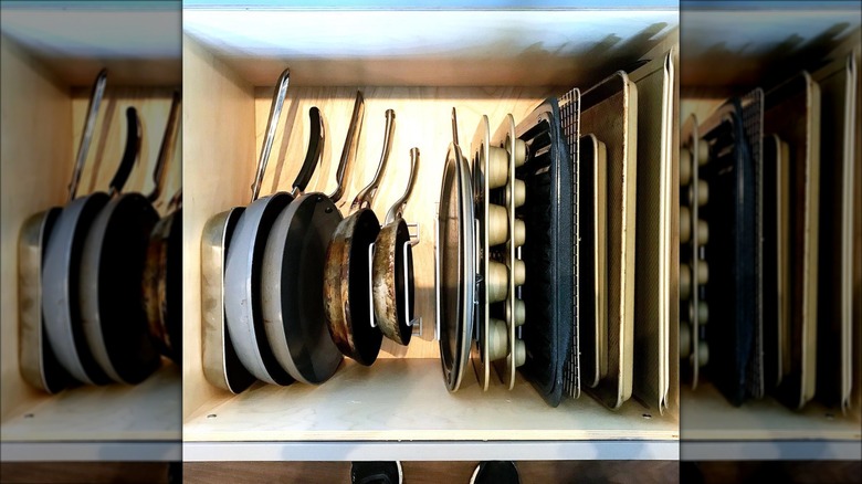 organized pans in deep drawer