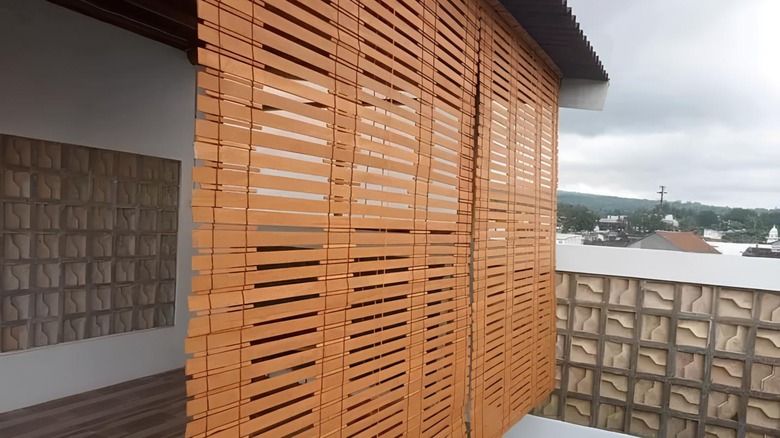 Wooden blinds on balcony awning