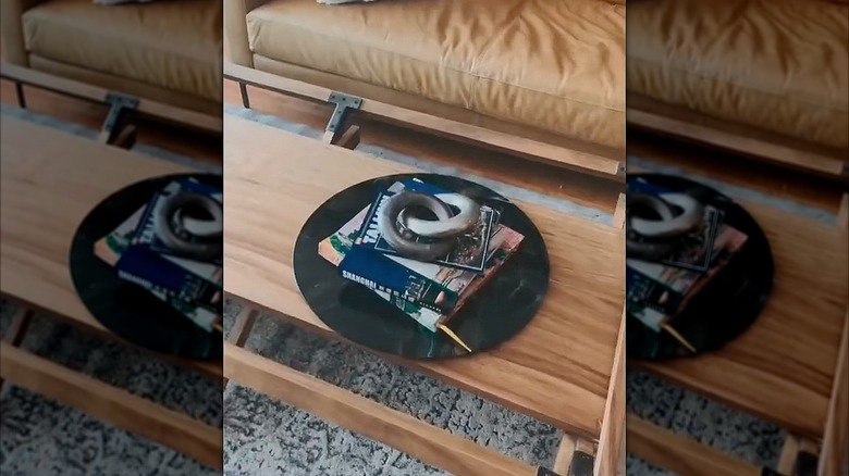 Lazy Susan on a coffee table with books on top