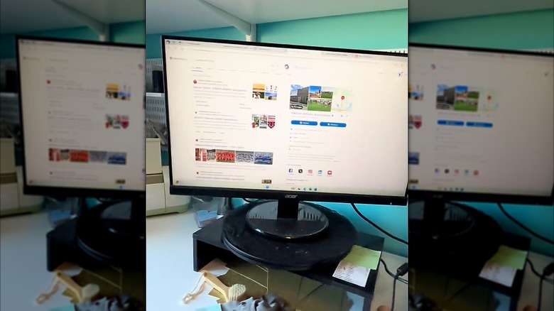 Computer monitor sitting on a lazy Susan