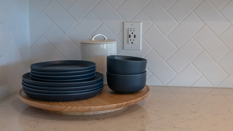 Lazy Susan on a counter with dishes on top