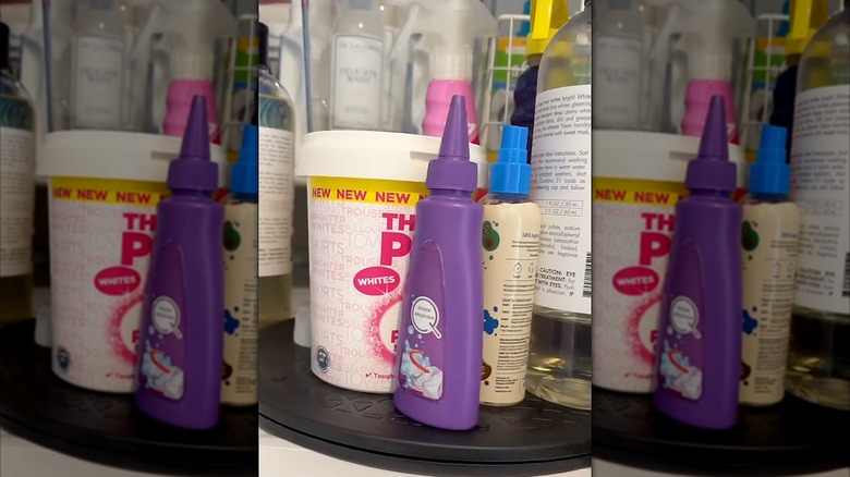 Detergents and cleaning supplies on top of a lazy Susan