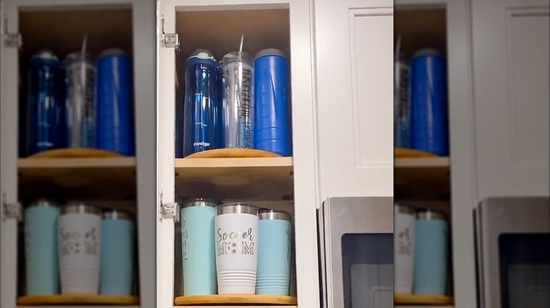 Different tumblers inside a pantry on a lazy Susan