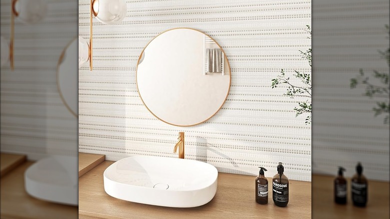 Simple striped wallpaper in a modern beige bathroom