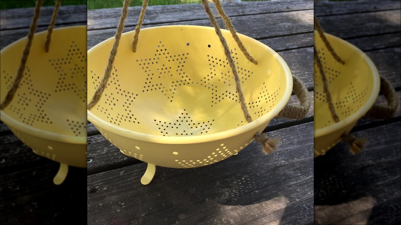 yellow colander hanging basket