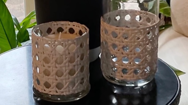 Candles wrapped with decorative caning