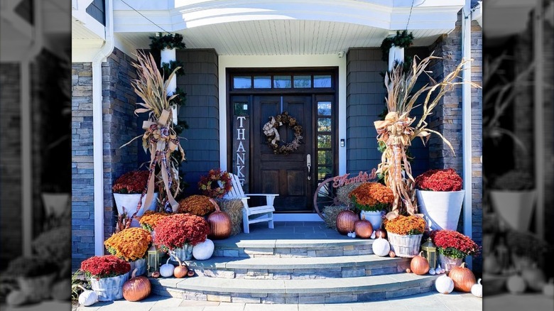 Front door porch with fall decorations