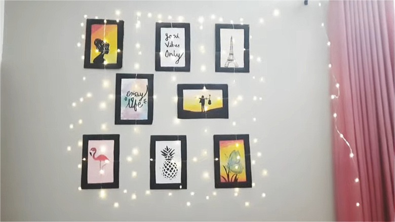 Christmas lights on gallery wall