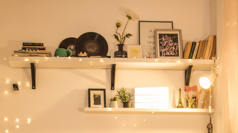 Christmas lights on wall shelves