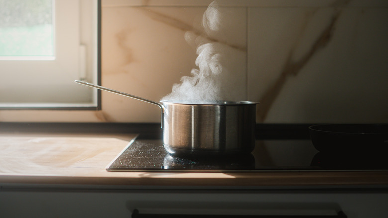 steaming pot on stove