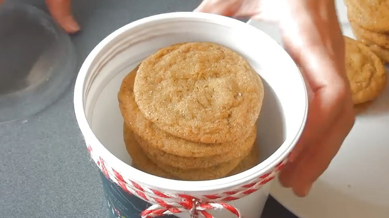 cookies stored in white yogurt container