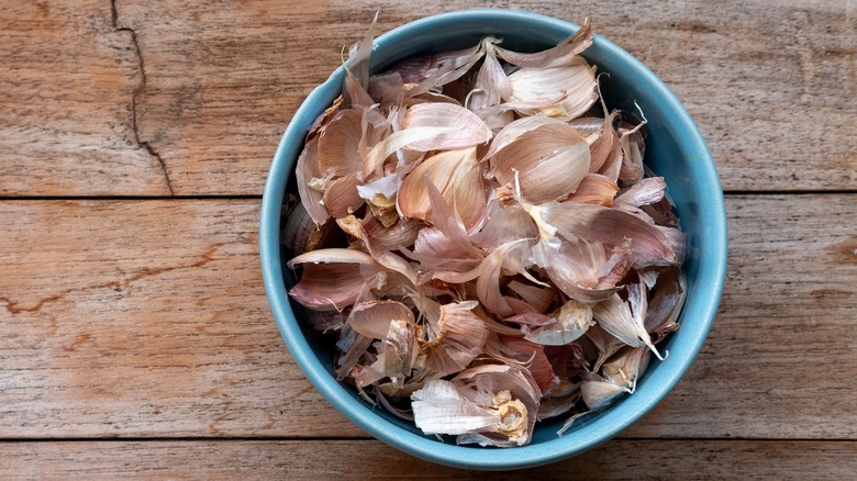 Garlic peels in a bowl