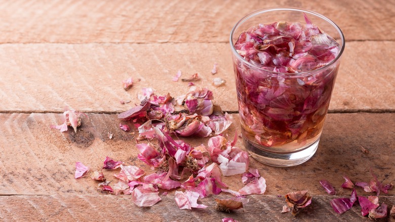 Onion peels in water glass