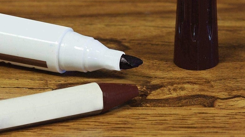 brown marker on wood table