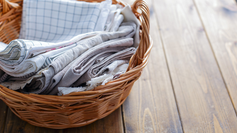 Basket of folded kitchen cloths