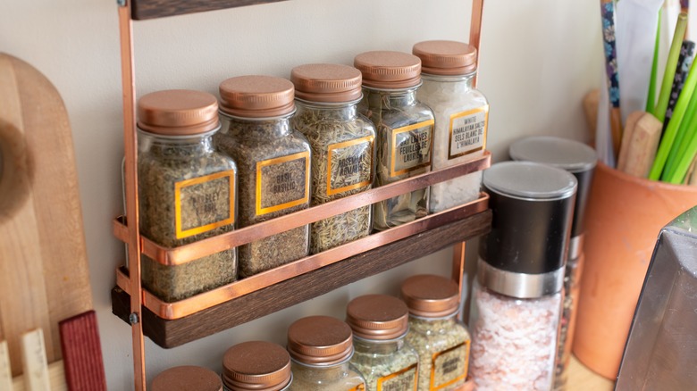 Shelf of spice containers