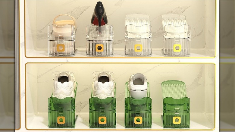 Clear and green shoe slots organizers on shelves