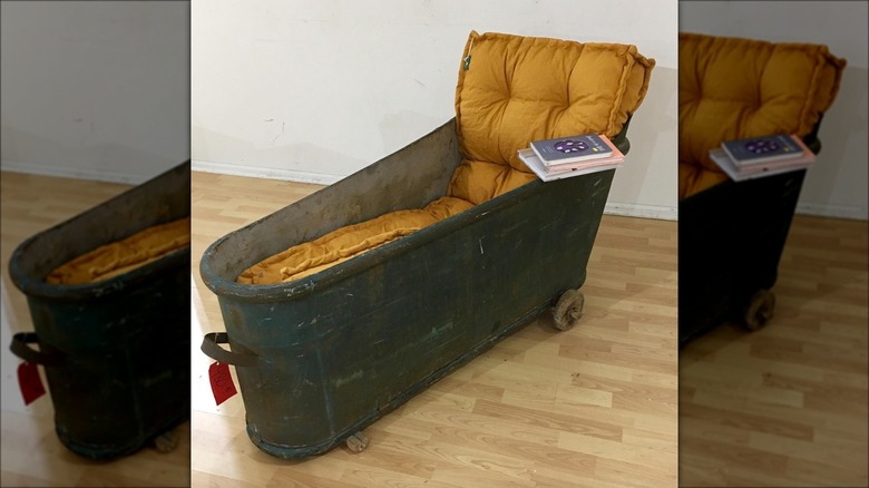 yellow and metal bathtub chair