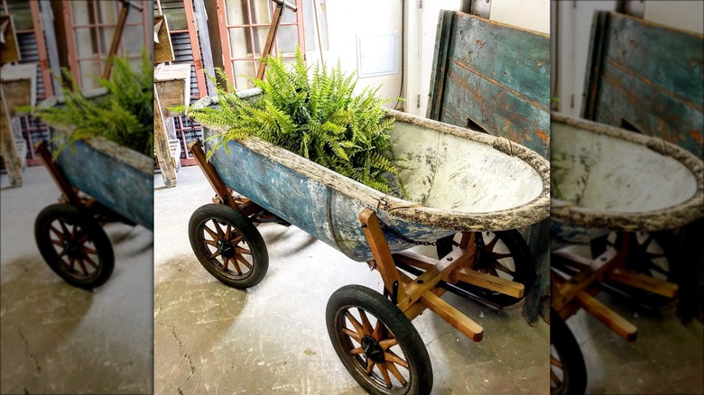 bathtub sitting on log cart