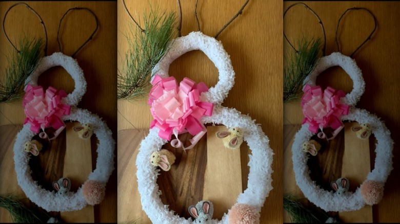 A wreath made from two rings and fashioned into the shape of a rabbit.