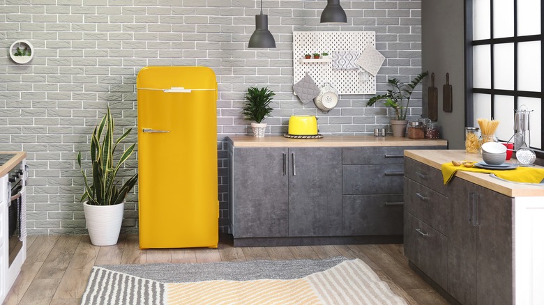 yellow retro fridge in kitchen