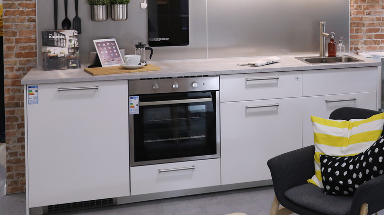 ikea kitchen with oven and dishwasher 