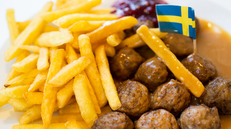 french fries and meatballs with a swedish flag 