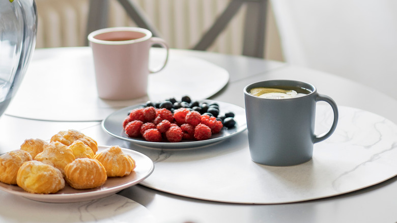 glass table set for breakfast 