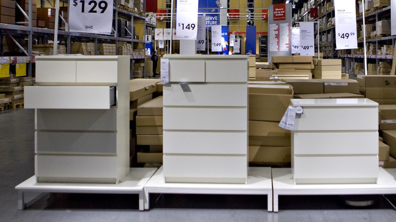 three white MALM dressers