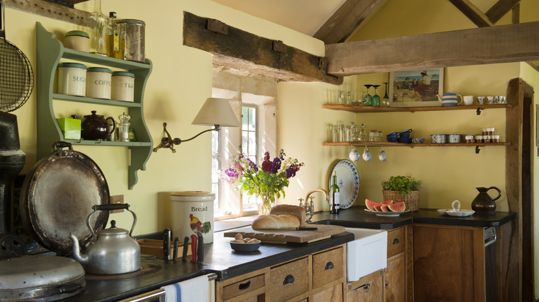 A country kitchen with pale yellow walls