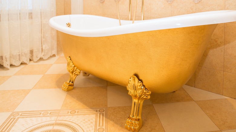 gold clawfoot tub