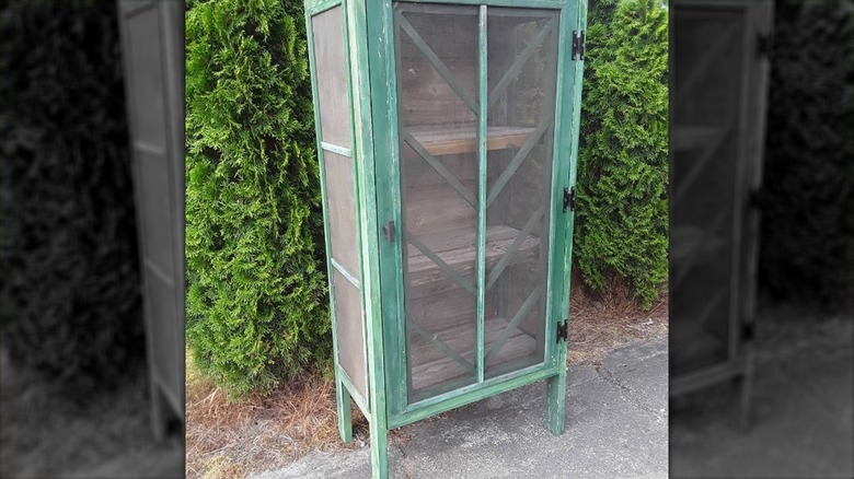 Cabinet from upcycled window screens