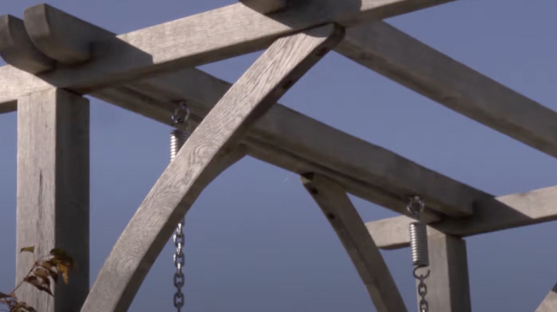 Using trampoline springs as suspension springs on a porch swing.