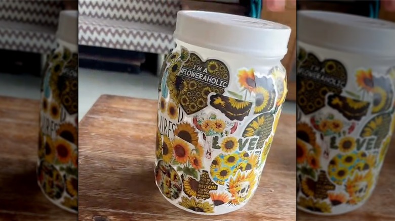 container with sunflower stickers