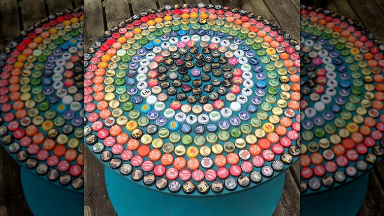 table with rainbow bottle caps