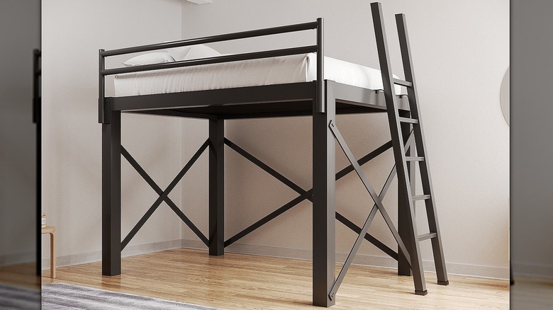 Black adult bunk bed in a bedroom