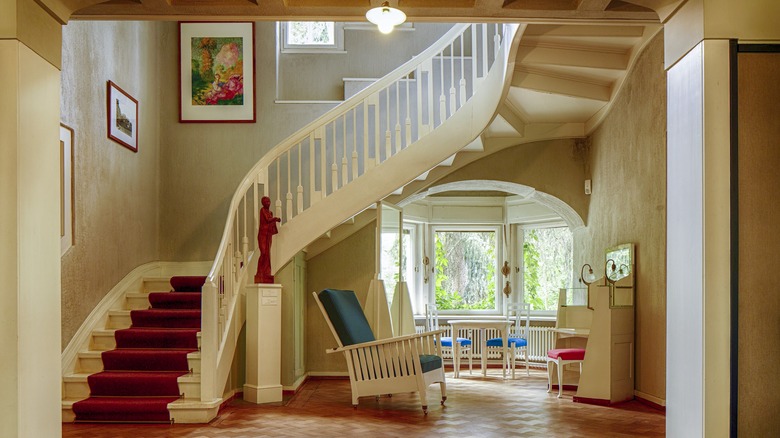 Ivory foyer with staircase