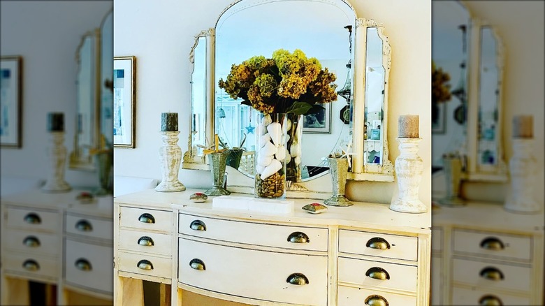 white antique vanity in dining room