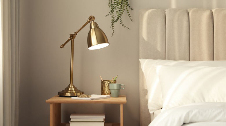 nightstand with task lamp