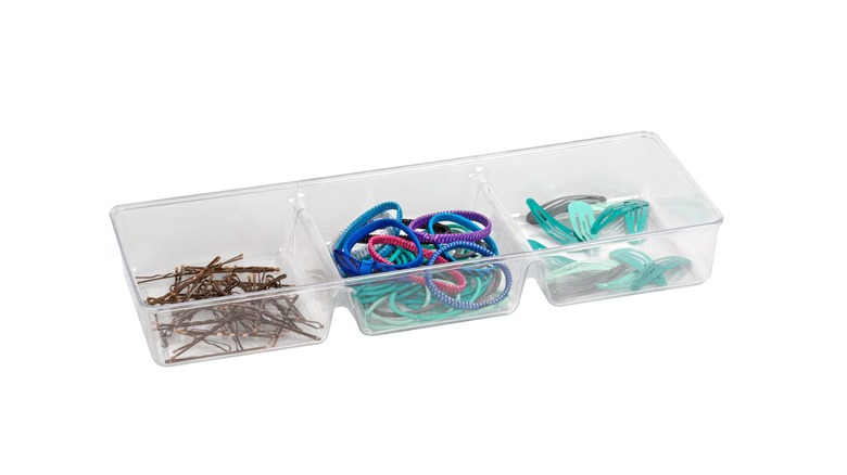 plastic tray with hair accessories