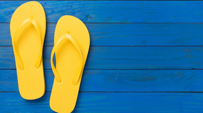 Pair of yellow flip flops