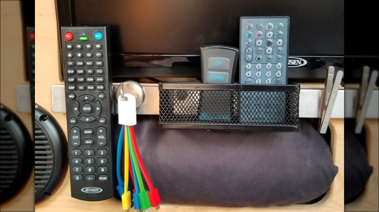 remotes and cords on magnetic strip